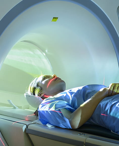 patient in PET scan machine