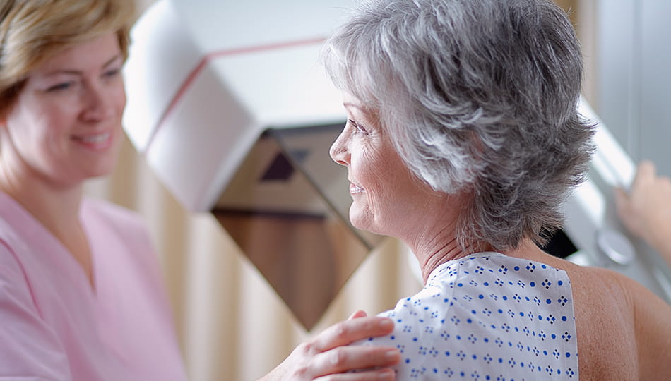 woman being screened for breast cancer